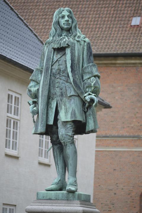 Statue of Chancellor Peder Griffenfeld and the Copenh Tower