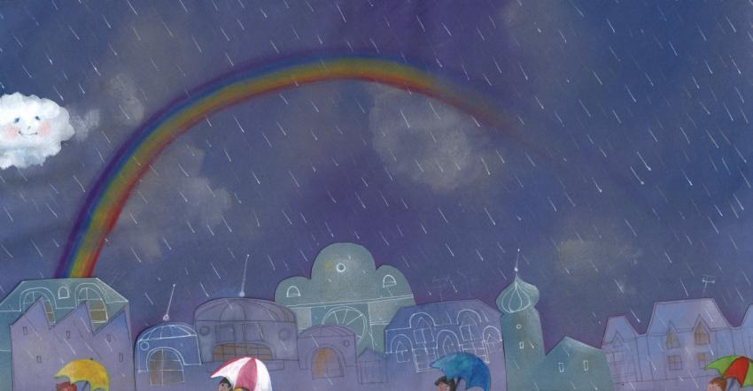 rain and rainbow above the city