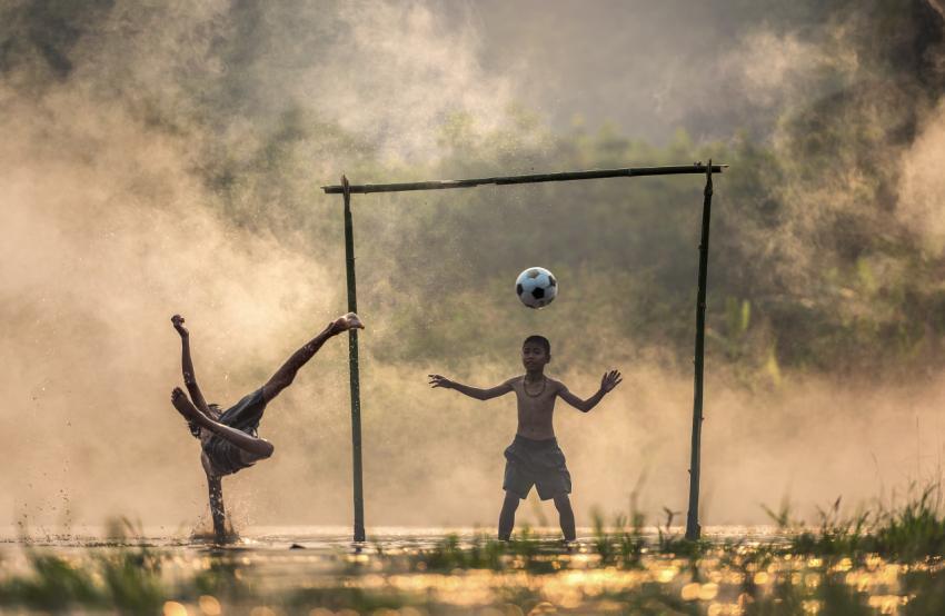 Boys playing football