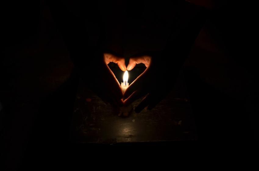 heart hands and candle