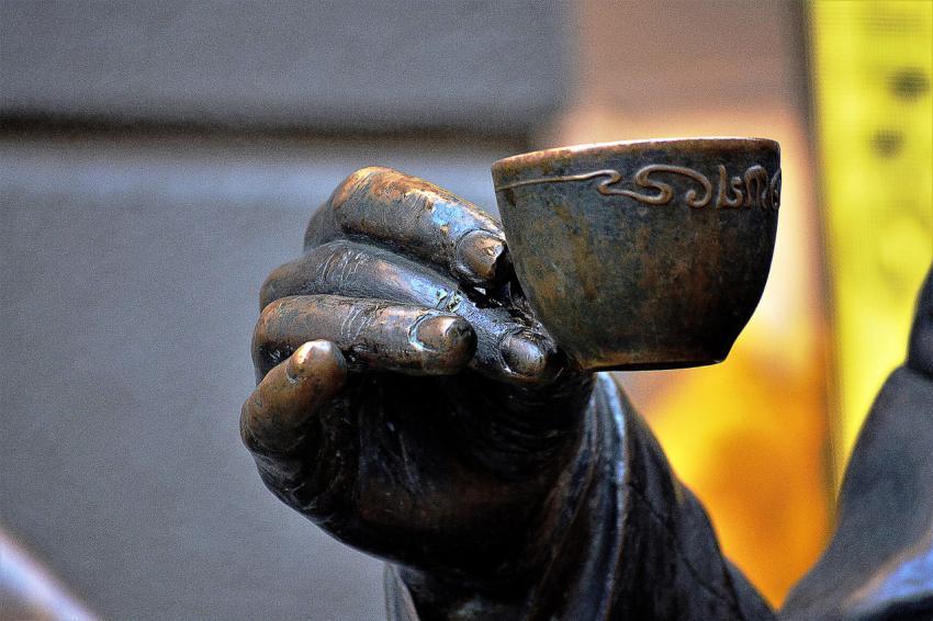 statue cup in hand