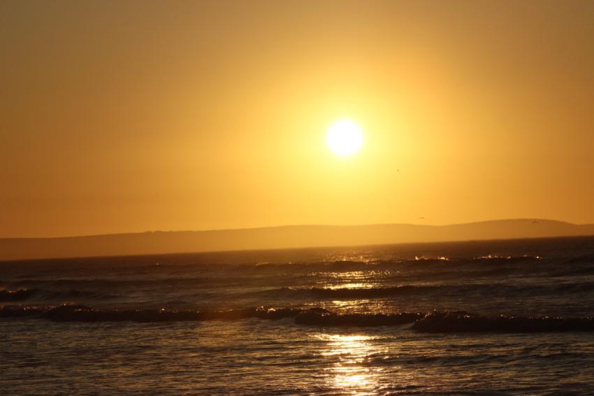 Bright sunset over the water