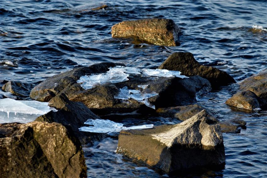 Blocks of stones among the sea waves