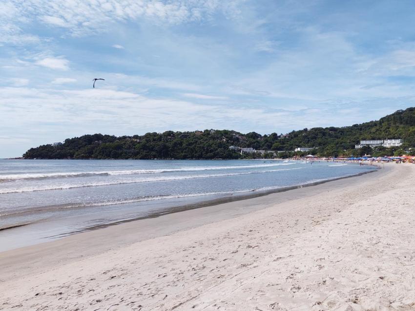 Ubatuba, Sao Paulo, Brazil, Feb 02, 2025, Toninhas Beach on a sunny day with light clouds.