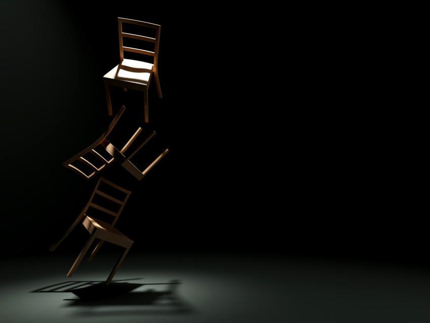 Three-dimensional installation of falling chairs
