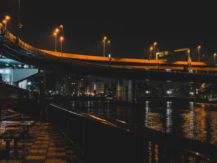 a bridge over a body of water at night
