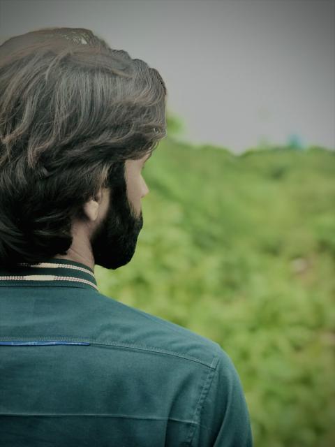 photo of a man from behind