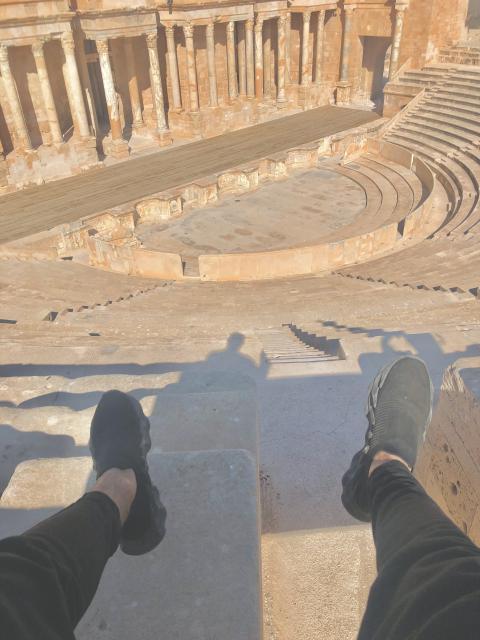 Ruins of an ancient amphitheater in Palmyra on the Syrian desert
