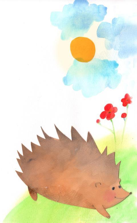 hedgehog on a flowery meadow on a sunny day